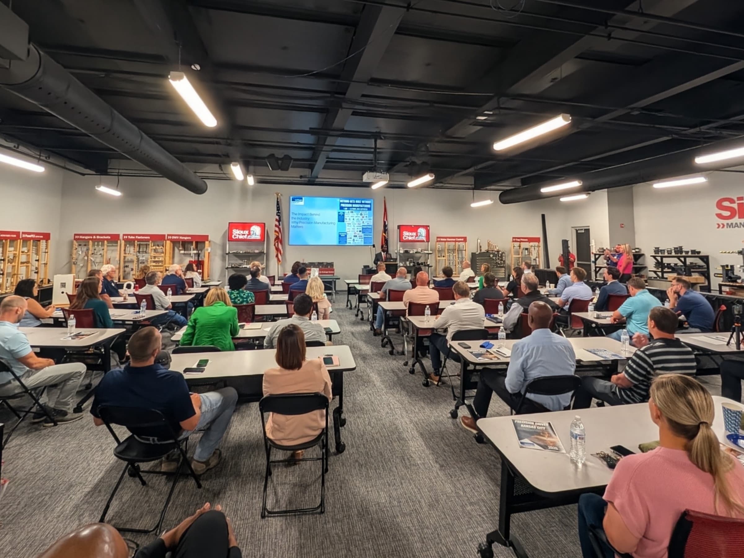 A full room of members at a monthly program hosted at Sioux Chief